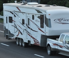 RV being hauled on a dually axle